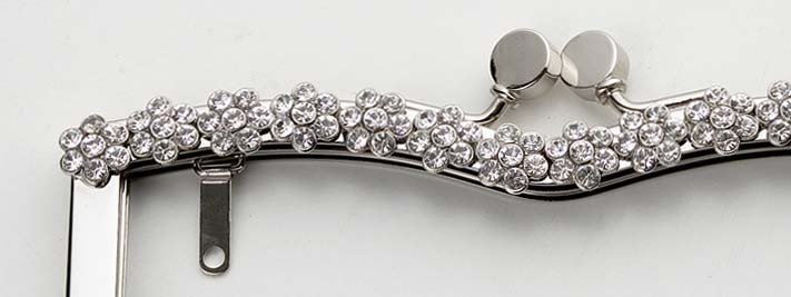 Accessori metallici per borse